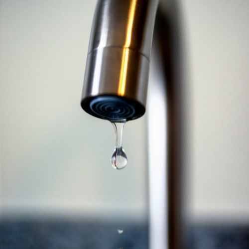Kitchen Sink Faucet Leaking DIY Fixes and When to Call a Plumber_ leaking faucet_The Geiler Company