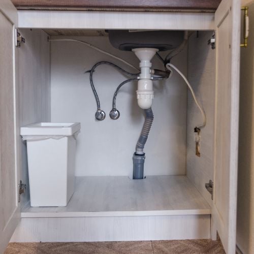 Kitchen Sink Not Draining DIY Fixes and When to Call The Geiler Company   - p trap- The Geiler Company (1)