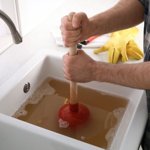 Kitchen Sink Not Draining DIY Fixes and When to Call The Geiler Company -flat plunger- The Geiler Company