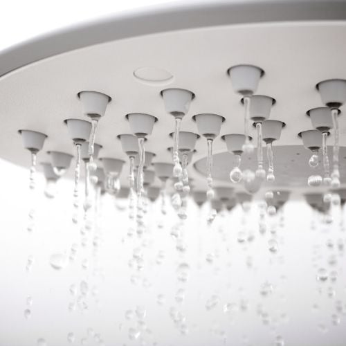 What is That Whistling Noise When I Turn My Shower On_ clogged shower head_the geiler company