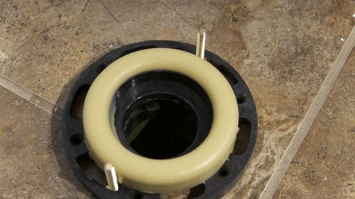 Why does my toilet rock back and forth_ flange  and wax ring_The Geiler Company