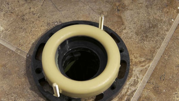 Why does my toilet rock back and forth_ flange  and wax ring_The Geiler Company
