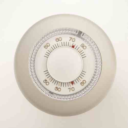 how to reduce your residential heating bill_ old thermostat_the geiler company